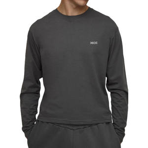 Camiseta de algodón de alta densidad para hombre, manga corta, color liso, corte holgado, estilo urbano minimalista, venta al por mayor, con marca. - Product Image 1