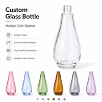 Flacon de parfum en verre transparent en forme de goutte personnalisé, pompe pulvérisatrice dorée de luxe, atomiseur de parfum rechargeable, conteneur cosmétique vide pour parfum