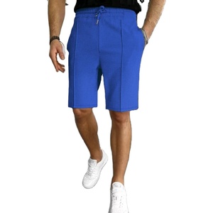 Nouveaux shorts décontractés pour hommes en tissu gaufré uni avec cordon de serrage, polyvalents, pour l'extérieur, style urbain, anti-froissement, séchage rapide, élastiques - Product Image 3