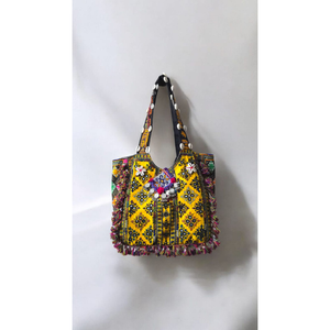 Artisan Sunshine: Bolso Tote Amarillo Vibrante Bordado a Mano con Trabajo de Espejo Tradicional, Patrones Tribales Intrincados y Multicolores - Product Image 1