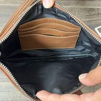 2025 à la mode en gros cheveux sur peau de vache métallisé en cuir véritable pochette de bracelet en cuir fait à la main de qualité supérieure Western Lady sac à main portefeuille
