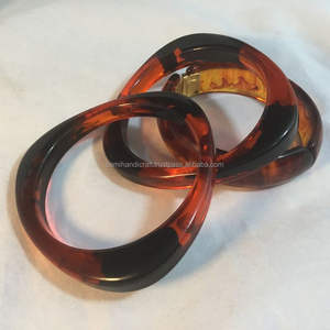 Classic Religious <b>Resin</b> Bangle Brown <b>Colour</b> Wedding Anniversary Pearl Diamond Round Shape Design Trendy Fashion Bangle - Product Image 1