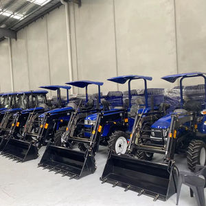 รถแทรกเตอร์ล้อ 12040 พร้อมที่ตักด้านหน้า ขับเคลื่อน 4 ล้อ สำหรับงานเกษตร สีฟ้า ใช้งานได้หลากหลายในฟาร์ม - Product Image 1