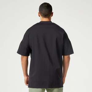 T-shirt pour homme en coton 100% noir, coupe ample, respirant, séchage rapide, tissu toile, épaules tombantes, personnalisable avec votre marque. - Product Image 4