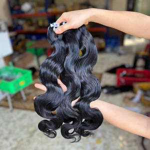 ผมเวียดนามแท้แบบมัดเป็นช่อ ขายส่ง ผมต่อแบบเครื่องจักรเย็บสองชั้น ทรงบอดี้เวฟ พร้อมเชือกผูกปิดผม คุณภาพสูง รับสั่งทำตามความต้องการ - Product Image 1