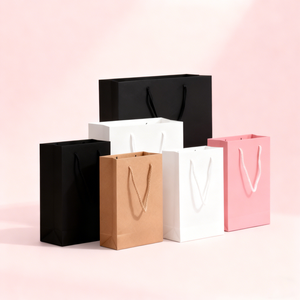 Customized Luxury Paperboard Shopping Bags with Cotton Rope Handles - Product Image 1