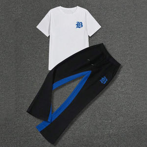 Ensemble coordonné pantalon de jogging en polyester bleu avec panneau contrastant et t-shirt blanc personnalisé, taille à cordon, style streetwear urbain, grande taille, automne - Product Image 1