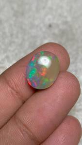Opale d'Éthiopie naturelle, pierre précieuse en vrac, taille ovale, 6 carats, jeu de couleurs, effet feu, certifiée IGI pour la fabrication de bijoux - Product Image 5