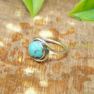 แหวนเงินแท้ 925 ประดับพลอยเทอร์ควอยซ์ธรรมชาติทรงกลมแบบคาโบชอง สีฟ้า ดีไซน์โบโฮสำหรับผู้หญิง - Product Image 6