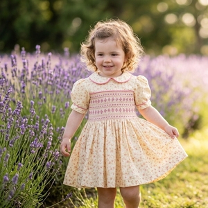 Robe pour filles, personnalisée, géométrique, ODM OEM, en coton bouffant jaune, élégante, prix d'usine, broderie smockée à la main, respirante, mignonne - Product Image 1