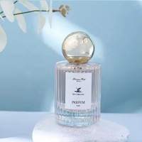 Flacon de parfum cylindrique de luxe personnalisé de 30 ml et 50 ml avec bouchon doré à bille, surface estampée à chaud pour flacon de parfum en verre