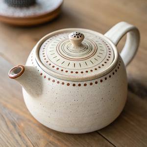 Tetera con diseño artístico, boquilla de vertido suave, mango de agarre cómodo, cuerpo que retiene el calor, perfecta para servir té - Product Image 4