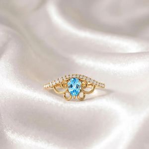 แหวนแต่งงานโทแพซสีฟ้าธรรมชาติทรงลูกแพร์ ทำมือ เงินแท้ 925 ชุบทอง 18K เครื่องประดับงานแต่งงาน ของขวัญเครื่องประดับชั้นดี - Product Image 1