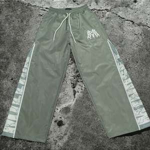 กางเกงวอร์มทรงหลวมของผู้ชายกางเกงไนลอนโพลีเอสเตอร์บล็อกสีกระเป๋าด้านหน้ายุทธวิธีแห้งเร็วยืดหยุ่นน้ำหนักเบา - Product Image 2