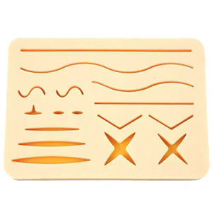 Coussin d'entraînement aux sutures médicales, usage clinique manuel, silicone 3 couches avec divers motifs de points pour étudiants en chirurgie Java - Product Image 1