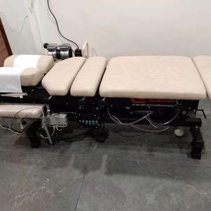 Lit de chiropratique électrique réglable en hauteur avec traction par flexion, structure en acier inoxydable pour usage clinique - Modèle - Product Image 1