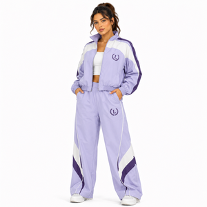 Ensemble coupe-vent personnalisé en polyester, veste zippée respirante et pantalon large brodé, tenue de sport quotidienne OEM - Product Image 1
