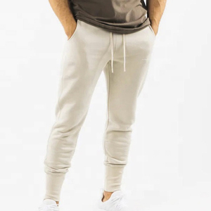 Pantalon de jogging en coton beige pour homme, taille élastique, cordon de serrage, poches latérales, style décontracté streetwear, idéal pour l'automne - Product Image 3
