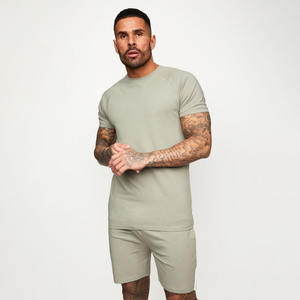 Ensemble T-shirt coupe-vent et short en coton biologique 2026 pour homme – Style streetwear 2 pièces avec logo frontal – Collection été pour homme - Product Image 3