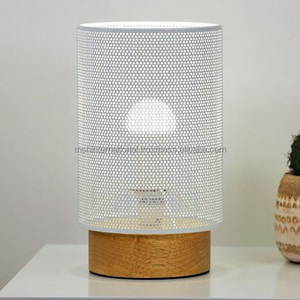 Jaula de malla dorada Lampbase Hotel Dormitorio Lámpara de mesa Elegante lámpara de noche de metal de franela azul - Product Image 1