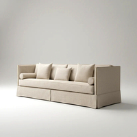 Canapé Ashford 3 places convertible gonflable de luxe moderne, avec dossier haut, structure en bois, revêtement en tissu mousse, garniture cloutée et coussins d'appoint