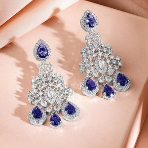 Parure de bijoux ethniques plaqués or avec collier, boucles d'oreilles et coiffe à motif floral pour femme, idéale pour les mariages et la mode - Product Image 4