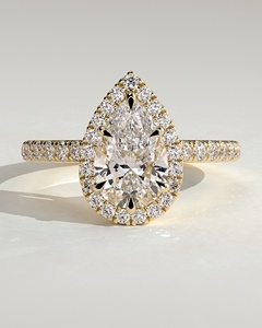 แหวนเพชรเม็ดเดี่ยวทรงลูกแพร์ 14k 18k ทองคำแท้ ประดับเพชร CVD แบบ Halo พร้อมขอบเพชร Pave Sett แหวนหมั้นสุดหรู OEM - Product Image 1