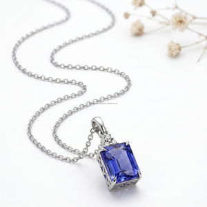 Tendances du moment : Collier en Tanzanite taille émeraude, Pendentifs et breloques raffinés en Or blanc 14K, Capricorn Ambition, Bijoux de luxe audacieux - Product Image 1