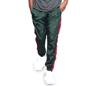 Pantalon de survêtement vert brillant pour homme avec bande latérale rouge contrastante, style streetwear, joggers en nylon coupe-vent, pantalon décontracté athlétique – Vente en gros - Product Image 1