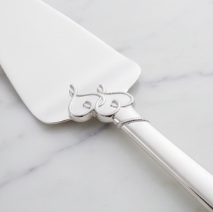 Juego de 2 piezas de cuchillo y espátula para pastel de acero inoxidable con mango de lazo plateado para uso en bodas y fiestas. - Product Image 2