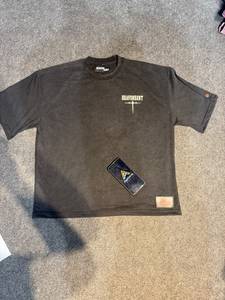 เสื้อยืดแขนสั้นสีดำทรงโอเวอร์ไซส์ คอโอ แบรนด์ Heavensent สำหรับผู้ชาย สไตล์ลำลอง โลโก้ด้านหน้า ผ้าคอตตอนเจอร์ซีย์เนื้อนุ่ม ระบายอากาศได้ดี - Product Image 1