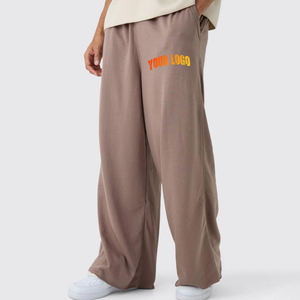 Pantalon de survêtement marron pour homme, coupe large, taille élastique, logo imprimé sur la jambe droite, style décontracté, en coton tricoté de poids moyen, vente en gros - Product Image 1