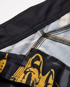 Shorts MMA pour hommes, noir et jaune, imprimé dragon, 100% polyester, séchage rapide, coupe classique, pour entraînement en arts martiaux mixtes - Product Image 2