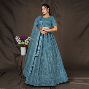 Lehenga Choli con bordado completo, borde de diseño, blusa a juego y dupatta suave y drapeada para ocasiones festivas - Product Image 1