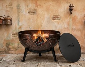 Deep circular <b>fire</b> pit made of iron with sturdy legs and vintage styling designed for safe backyard heating - Product Image 1