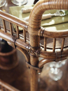 Modern Rattan Two-Tiered Black and Gold Hotel Serving <b>Table</b> with Four Swivel Wheels and Wine Rack - Product Image 4