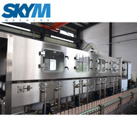 Machine de remplissage d'eau automatique pour fûts en plastique de 5 gallons, contrôlée par PLC, machine 3-en-1 de lavage, remplissage et bouchage