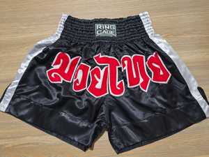 Shorts de Muay Thai légers et respirants avec ceinture élastique, coupe flexible, tissu à séchage rapide pour l'entraînement et les séances de sport, service OEM disponible. - Product Image 1
