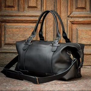 กระเป๋าเดินทางหนังแท้คุณภาพส่งออก สไตล์วินเทจ สำหรับวันหยุดสุดสัปดาห์  แบบ unisex น้ำหนักเบา ความจุมาก พร้อมซิป ขายส่ง - Product Image 1