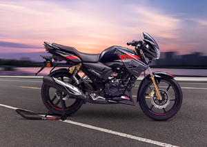 Motocyclette TVS "APACHE RTR 180" avec des touches sportives rouge, noir, argent et bleu vif, style Scrambler. - Product Image 4