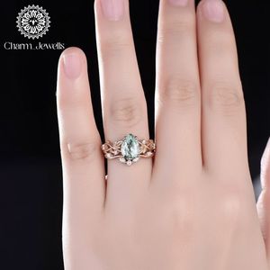 Bague de fiançailles en or rose pour femme Charm_Jewells, moissanite taille coussin, motif floral, sertissage à griffes, classique, certifiée IGI, 3 grammes - Product Image 1