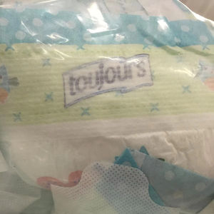 Tecnología de tela avanzada de triple capa, impermeable y altamente transpirable para una comodidad durante todo el día. Pañal impermeable para bebé con cinta adhesiva. - Product Image 1