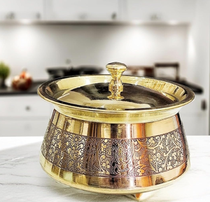 Majestic brass handi featuring a wide dark-etched floral pattern band and elegant matching lid. Available at wholesale price. - Product Image 1