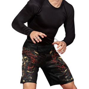 Shorts de MMA color negro, ligeros, con cordones ajustables, elásticos en cuatro direcciones y ajuste seguro para entrenamiento y competición de artes marciales. - Product Image 5