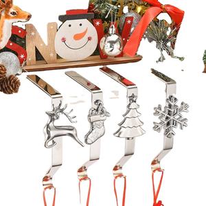 Soportes de calcetín de Navidad para manto Juego de 4, perchas de calcetín ponderadas para ganchos de calcetín de repisa para decoración de Navidad (Plata) - Product Image 1