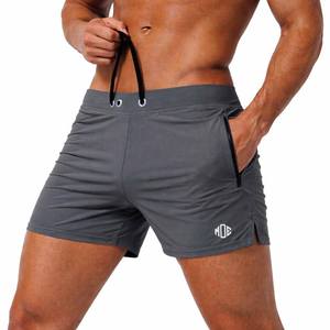 Pantalones Cortos Deportivos para Hombre, Corte Ajustado, para Gimnasio y Running, de Poliéster Elástico, con Cordón, Bolsillos con Cremallera, Suministro al por Mayor - Product Image 1