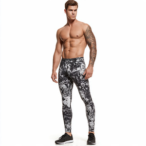 Leggings de sport pour homme, bas de gamme, couleur unie, compression, 100% polyester, haute qualité, pour entraînement et fitness - Product Image 1