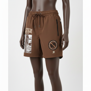 กางเกงขาสั้นวินด์เบรกเกอร์สำหรับผู้หญิง ผ้าไนลอนพรีเมียม สีน้ำตาลล้วน พร้อมปักโลโก้ด้วยไหมเชนีล และแผ่นปะลาย PVC - Product Image 4