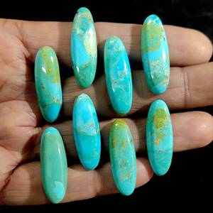 Turquesa Mohave Azul Natural AAA++ de 7x14MM, Gema Ovalada Larga Calibrada con Base Plana para Joyería - Product Image 1