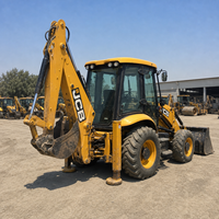Chargeuse-pelleteuse JCB 4CX d'occasion avec moteur fiable
